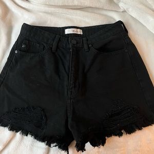 Black distressed shorts